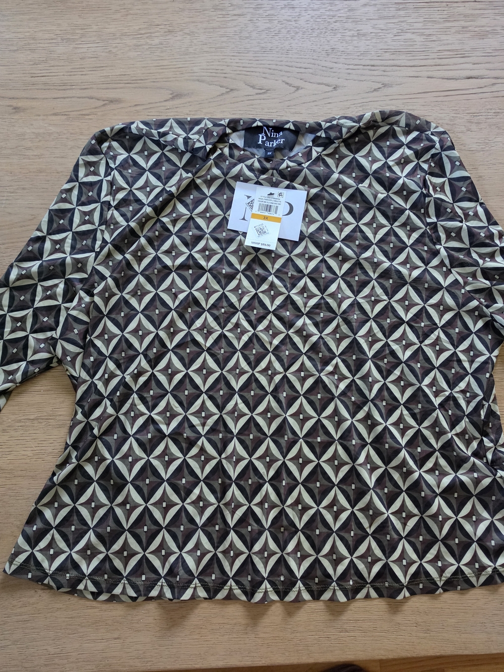 Nina Parker Sheer long-sleeve top  o